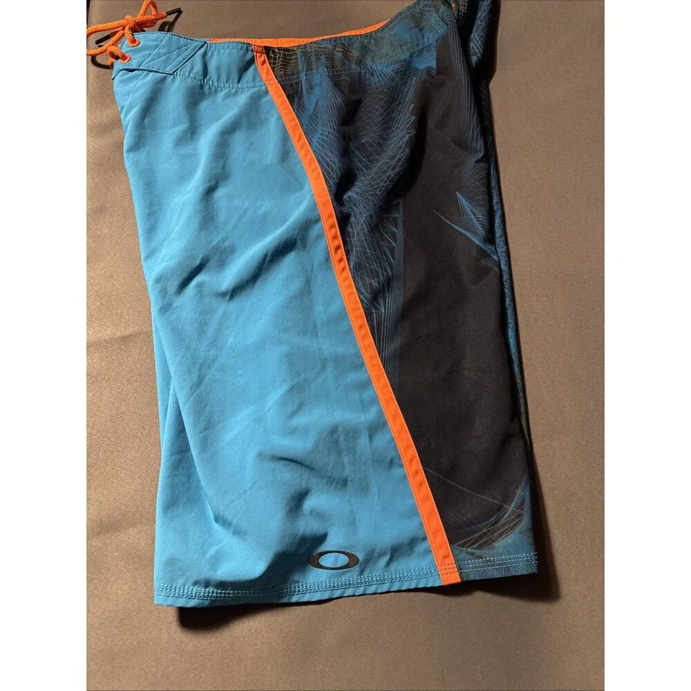 Oakley 32 Blue Board Shorts Zip Pocket Orange Regular Fit Swim Skull Y2K Print